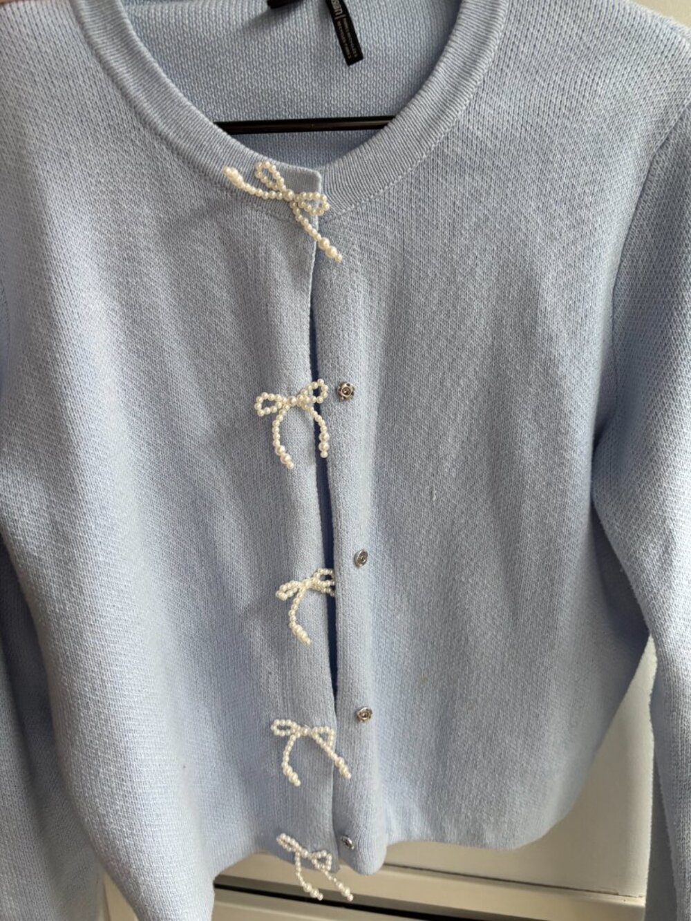 Simons: ICONE Pearly bow button boxy-fit cardigan